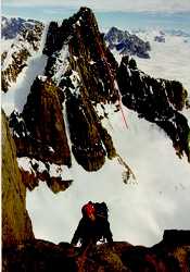 The Actress, from the top of Bishop's finger. The route enters a cleft in the rock at about two-thirds height